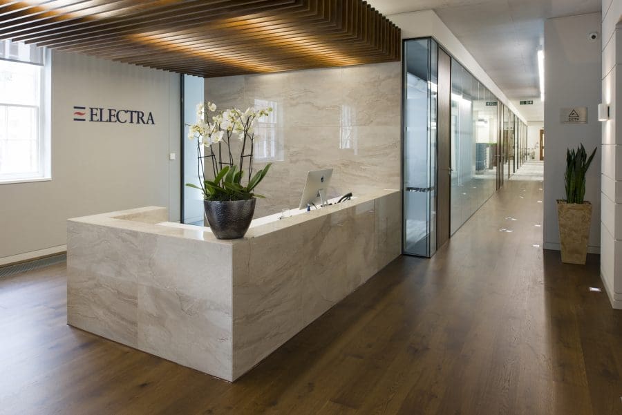 plant on marble reception desk making