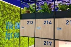 storage lockers next to green wall